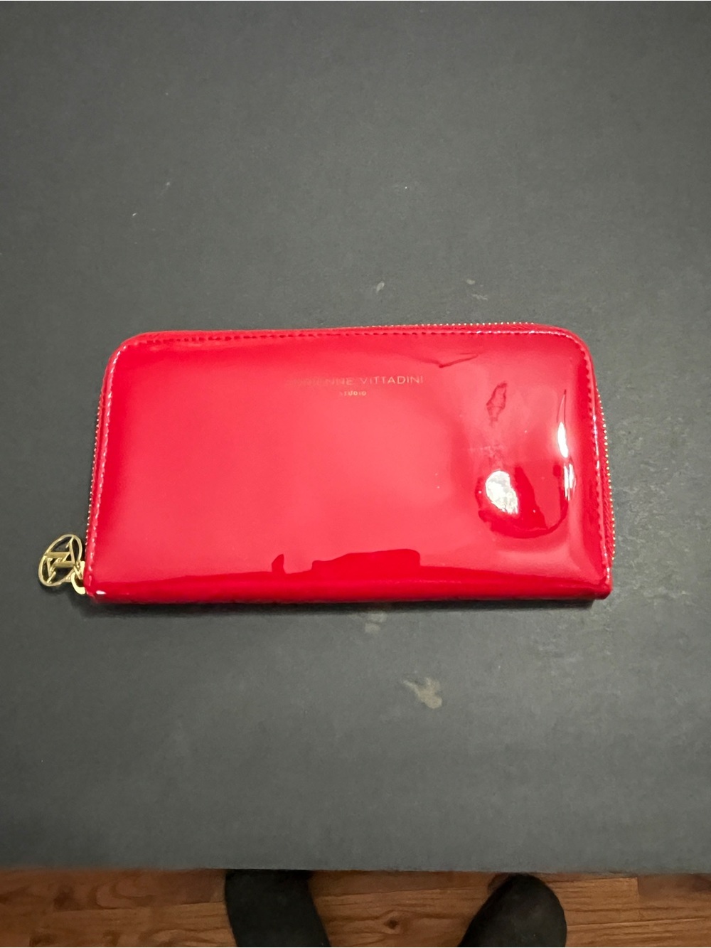 patent leather Adrienne Vittadini Studio Wallet featuring a zip-around